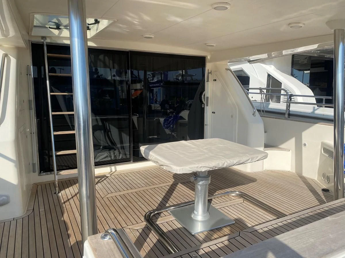a room with a table and chairs aboard AMADEUS Yacht for Sale
