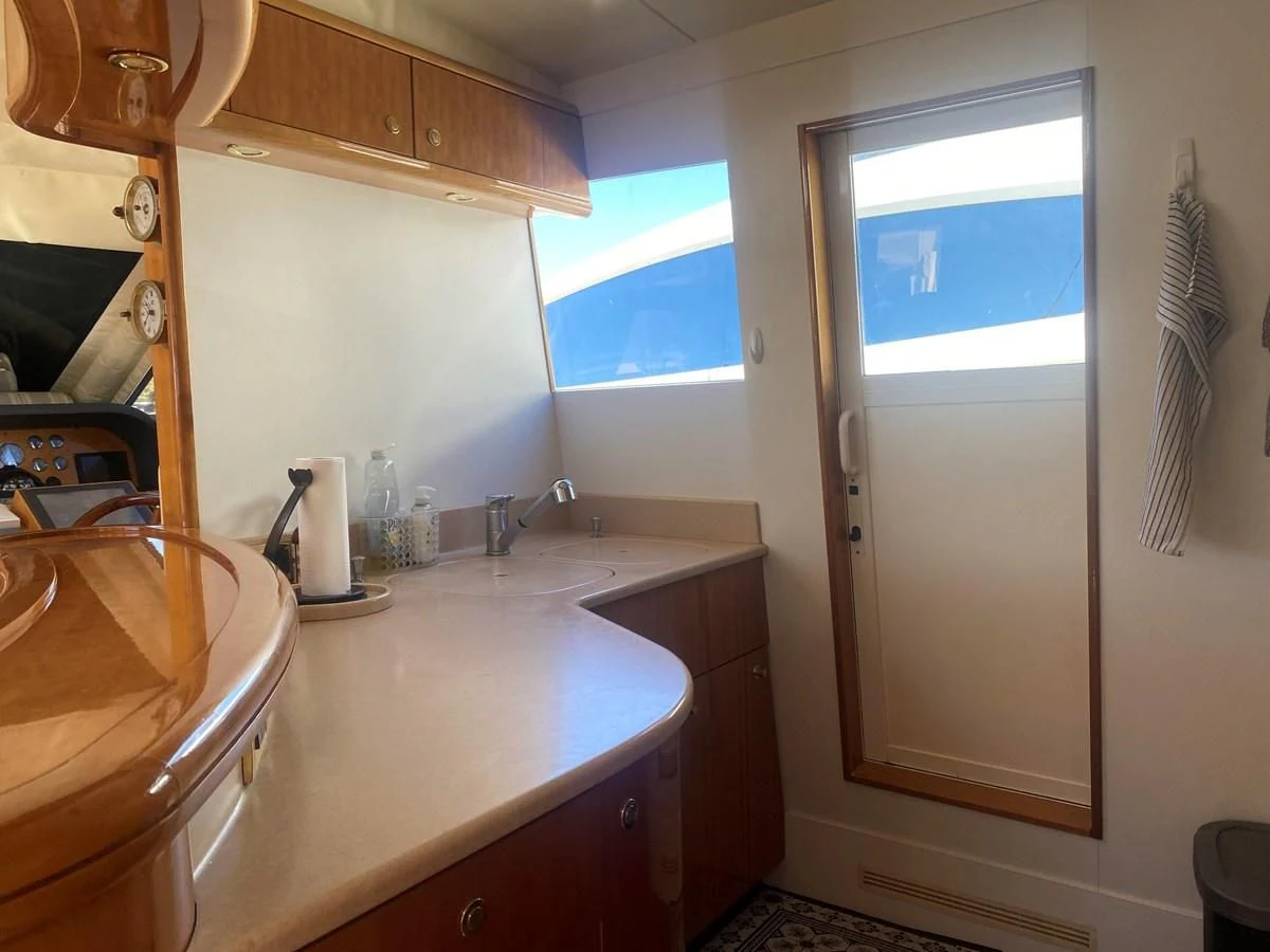 a bathroom with a large mirror aboard AMADEUS Yacht for Sale