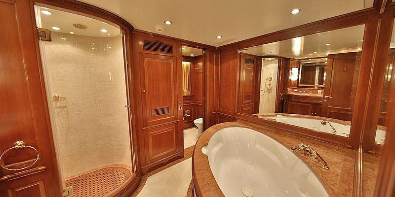 a bathroom with a large bathtub aboard NEMA Yacht for Sale