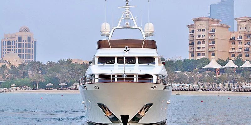 a large white boat in the water aboard NEMA Yacht for Sale