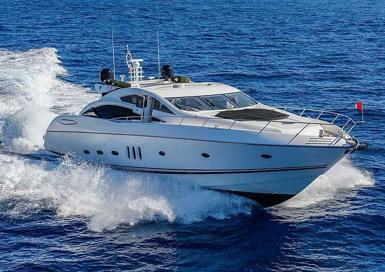 a white yacht on the water aboard PHOENIX Yacht for Sale