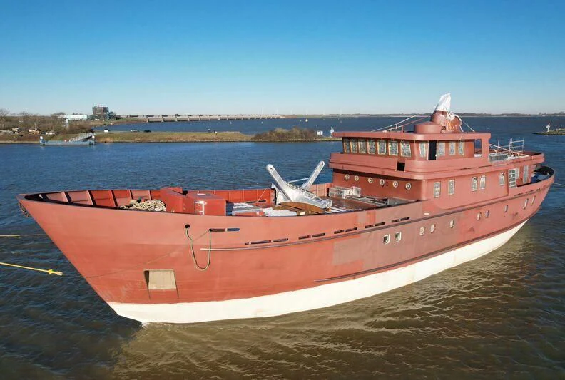 a large ship on the water aboard VEGA Yacht for Sale