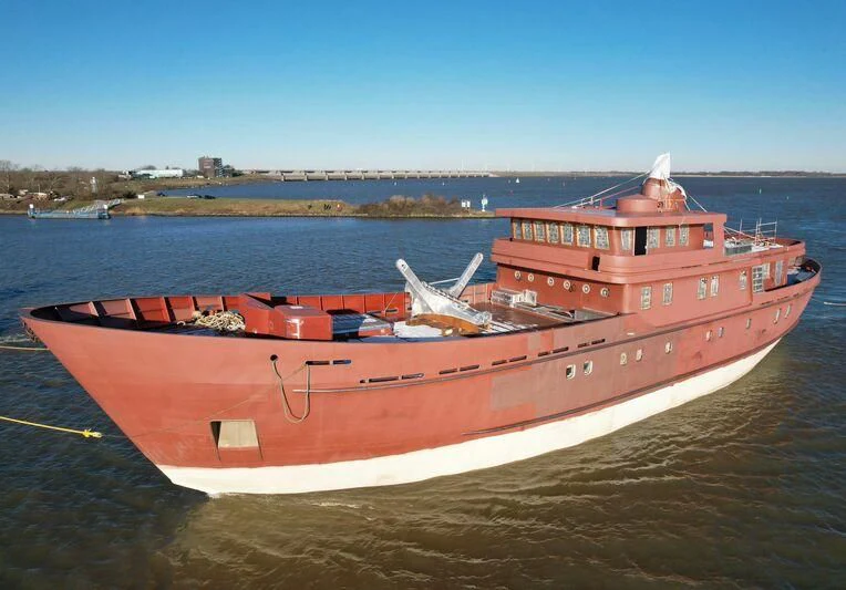 a large ship in the water aboard VEGA Yacht for Sale