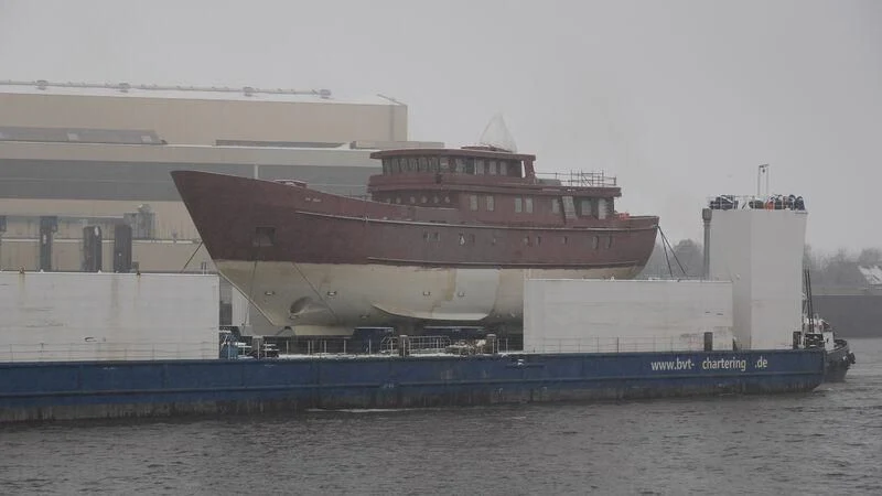 a large ship in the water aboard VEGA Yacht for Sale