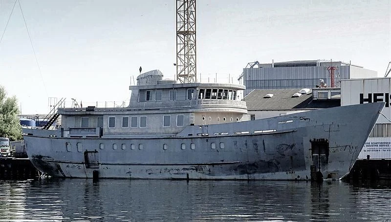 a large ship docked aboard VEGA Yacht for Sale