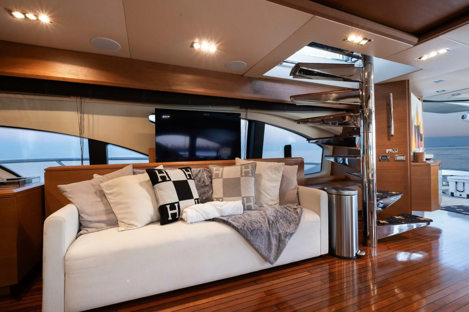 a living room with a large window aboard INTERVENTION Yacht for Sale