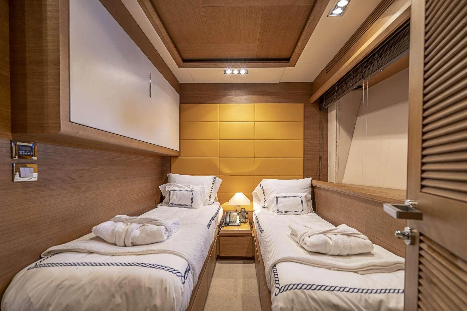 a room with two beds aboard INTERVENTION Yacht for Sale