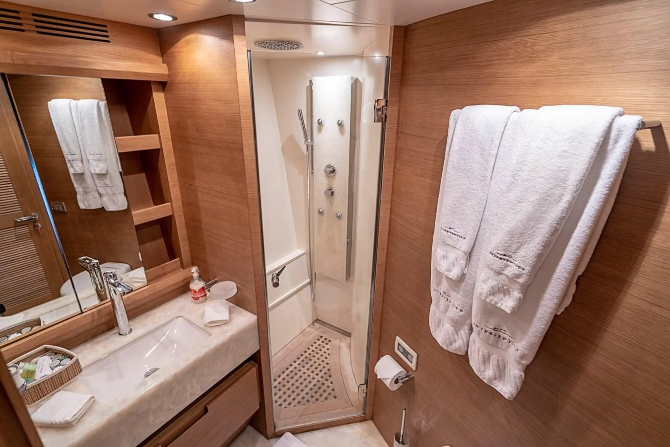 a bathroom with a large mirror aboard INTERVENTION Yacht for Sale