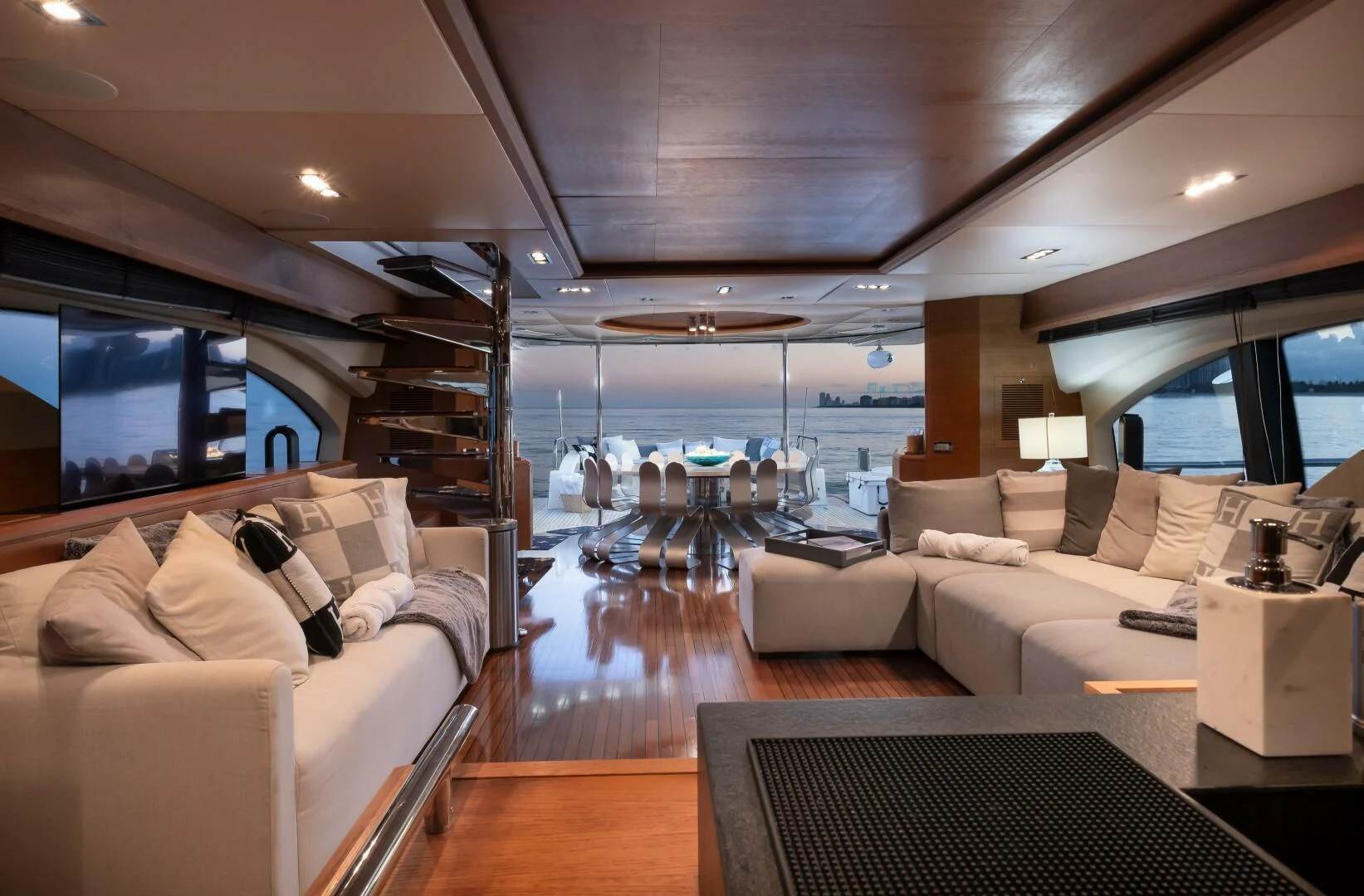 a living room with a large window aboard INTERVENTION Yacht for Sale