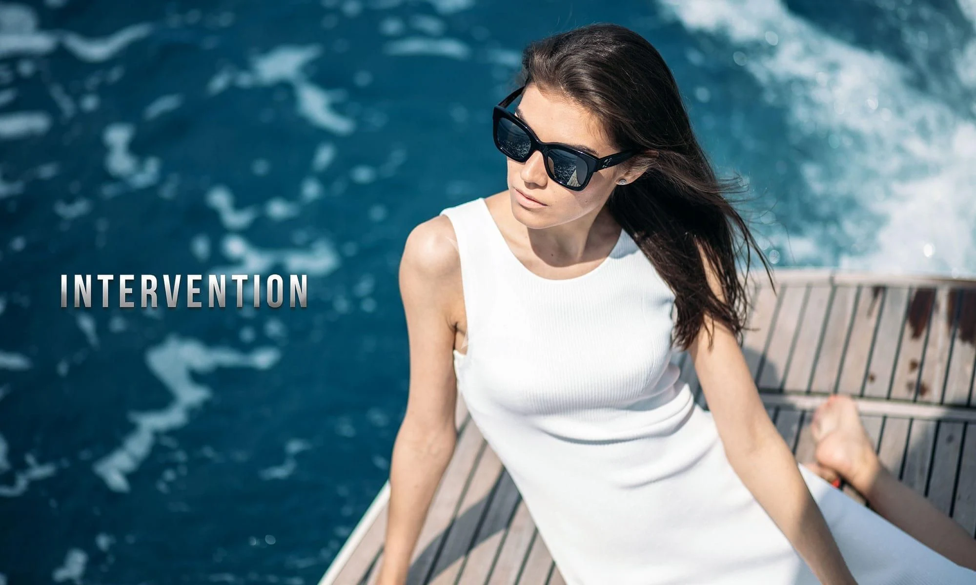 a woman wearing sunglasses aboard INTERVENTION Yacht for Sale