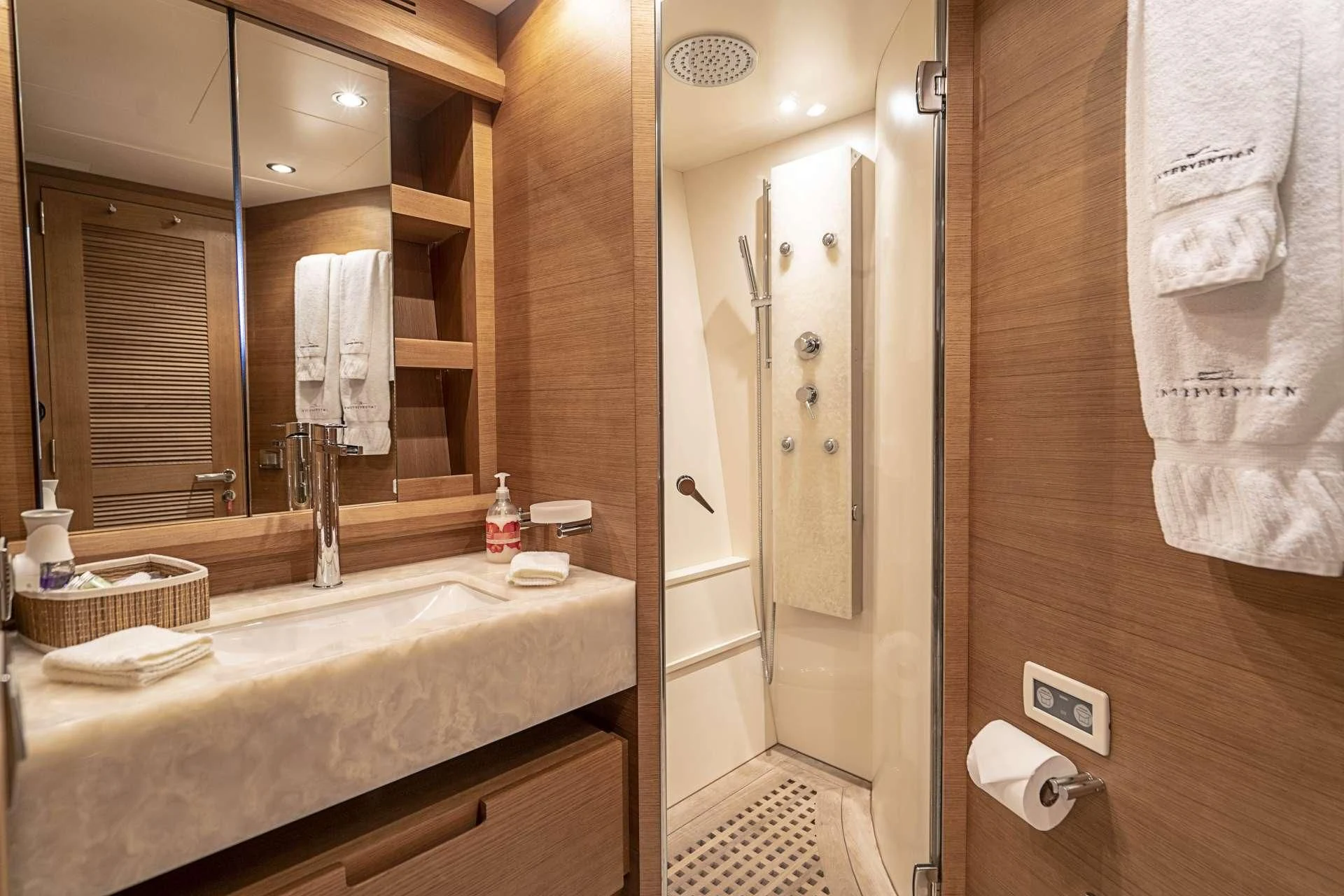 a bathroom with a large mirror aboard INTERVENTION Yacht for Sale