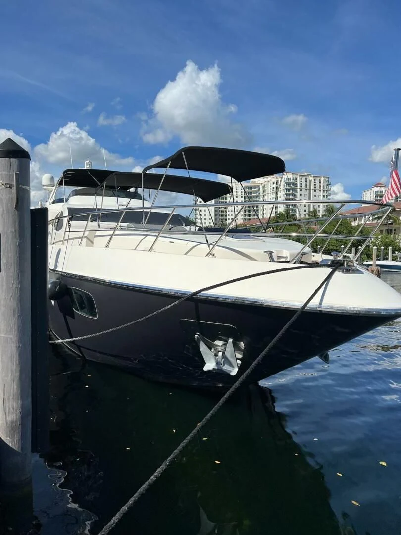 a boat docked at a pier aboard INTERVENTION Yacht for Sale
