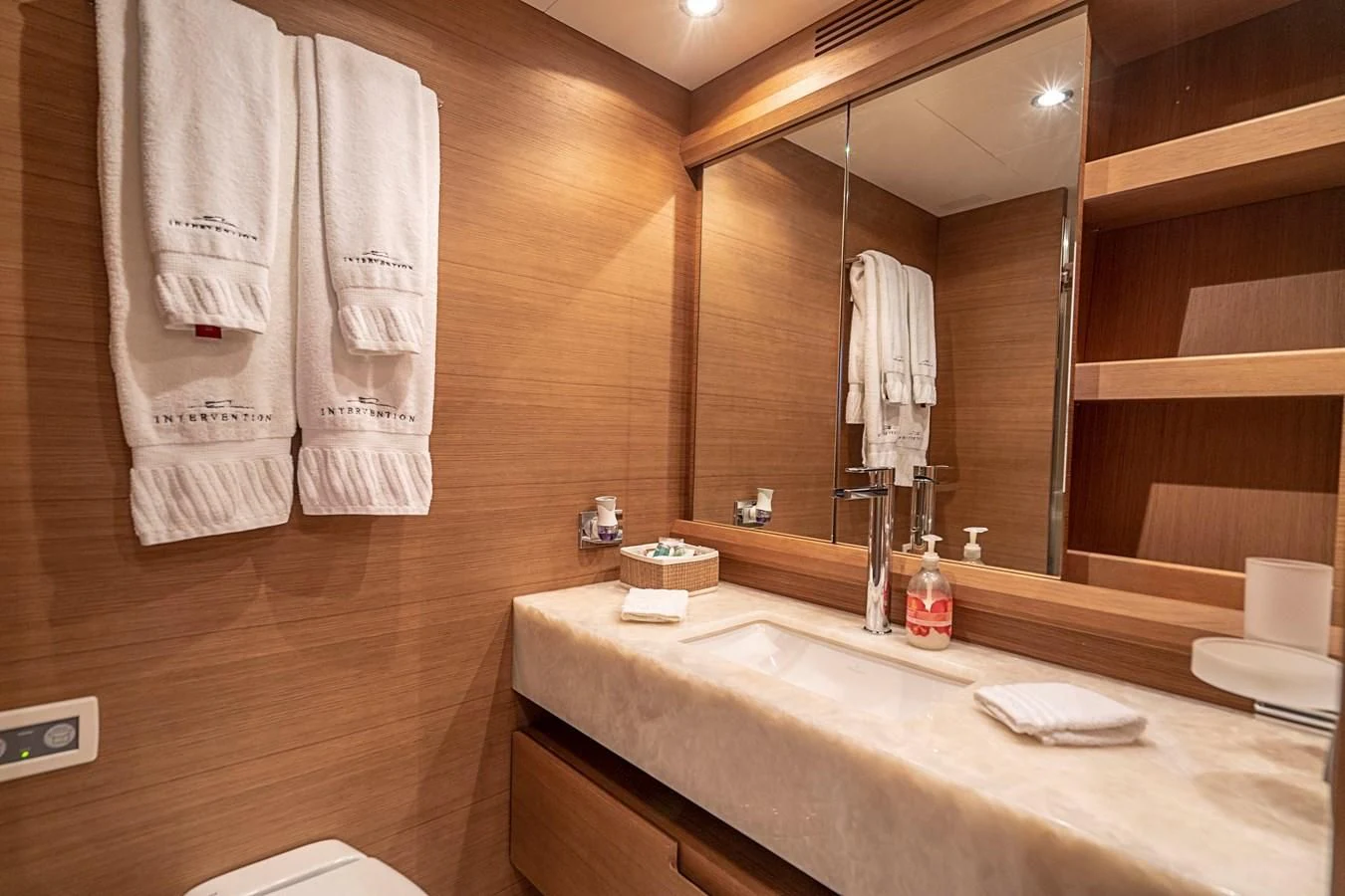 a bathroom with a large mirror aboard INTERVENTION Yacht for Sale