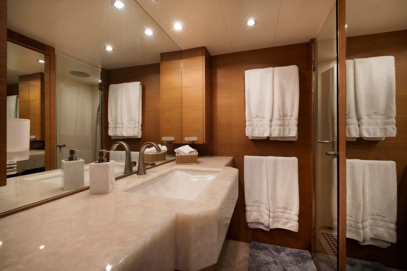 a bathroom with a large mirror aboard INTERVENTION Yacht for Sale
