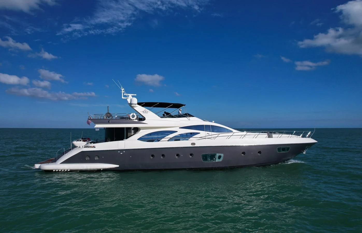 a white yacht in the water aboard INTERVENTION Yacht for Sale