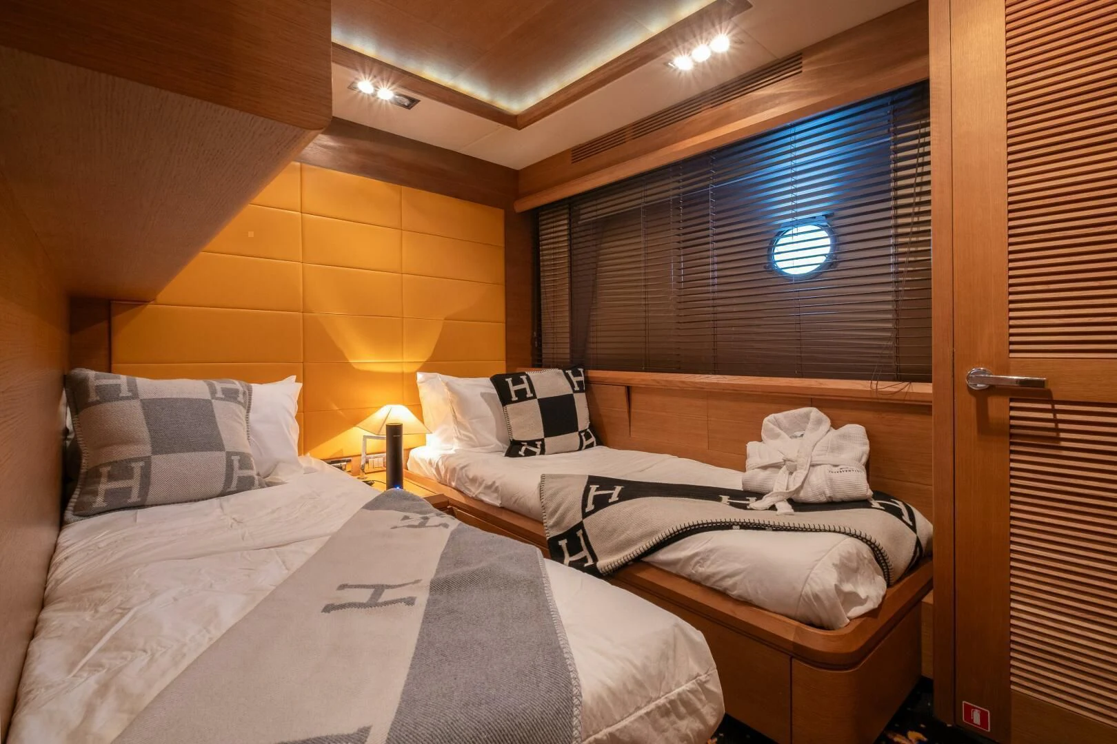 a room with two beds aboard INTERVENTION Yacht for Sale