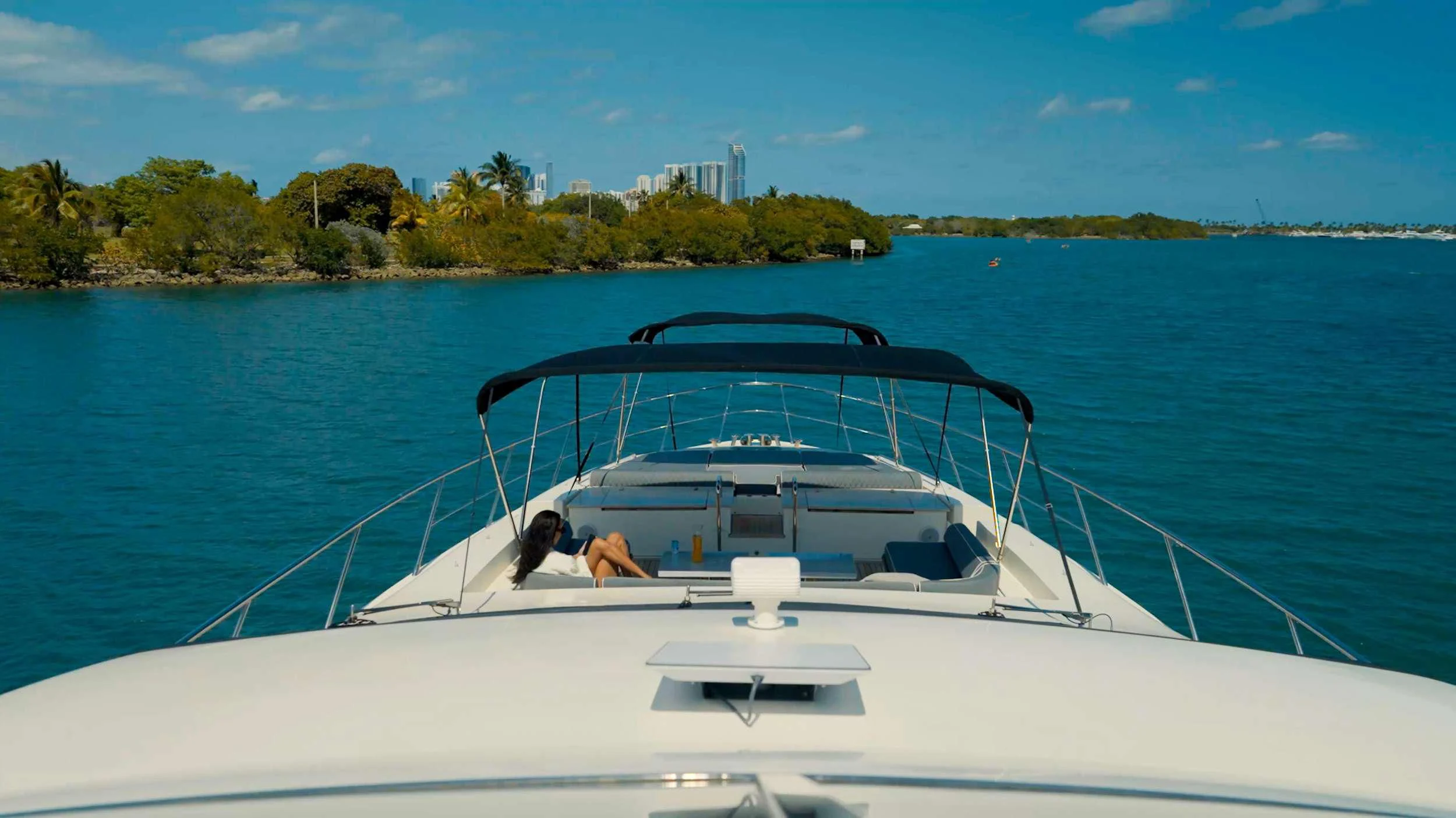 a white boat on the water aboard INTERVENTION Yacht for Sale
