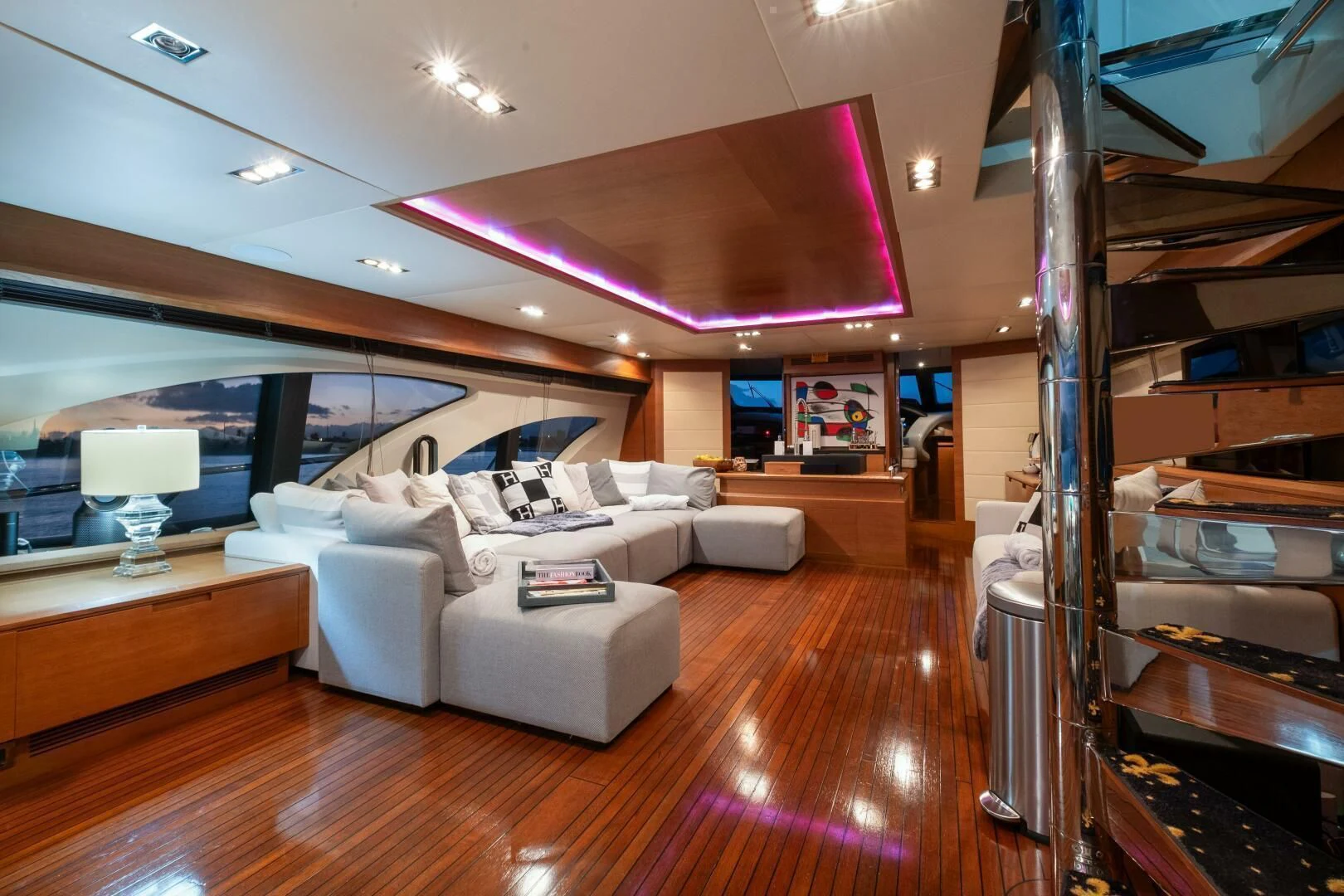 a living room with a large window aboard INTERVENTION Yacht for Sale