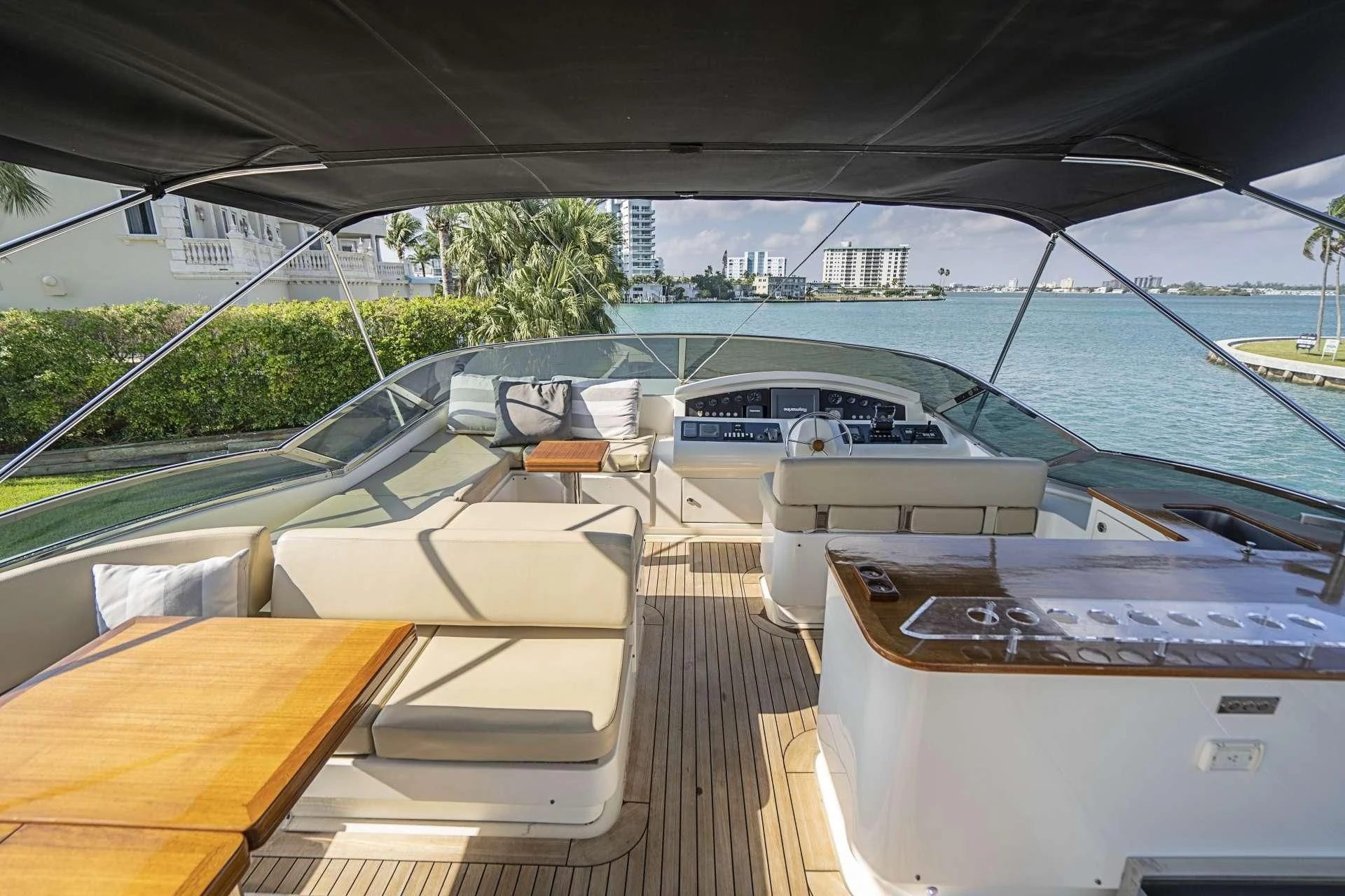 a deck with a view of a city and water aboard INTERVENTION Yacht for Sale