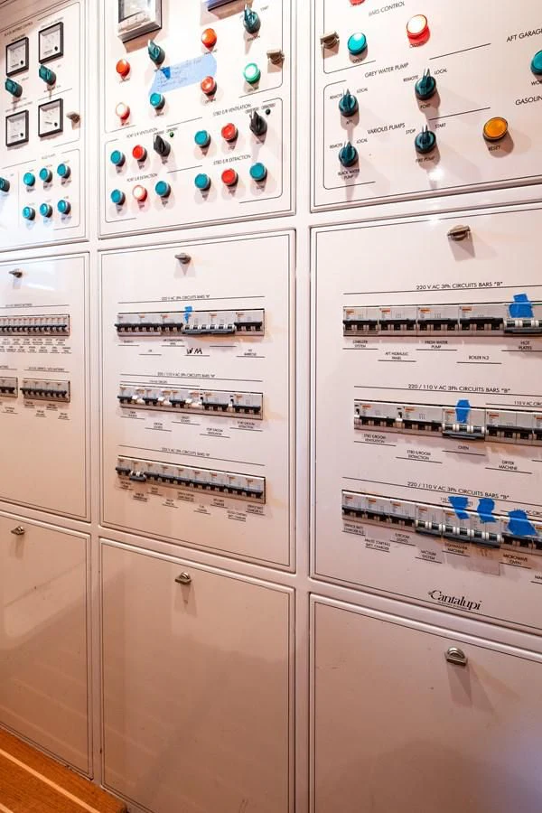 a refrigerator with magnets on it aboard INTERVENTION Yacht for Sale