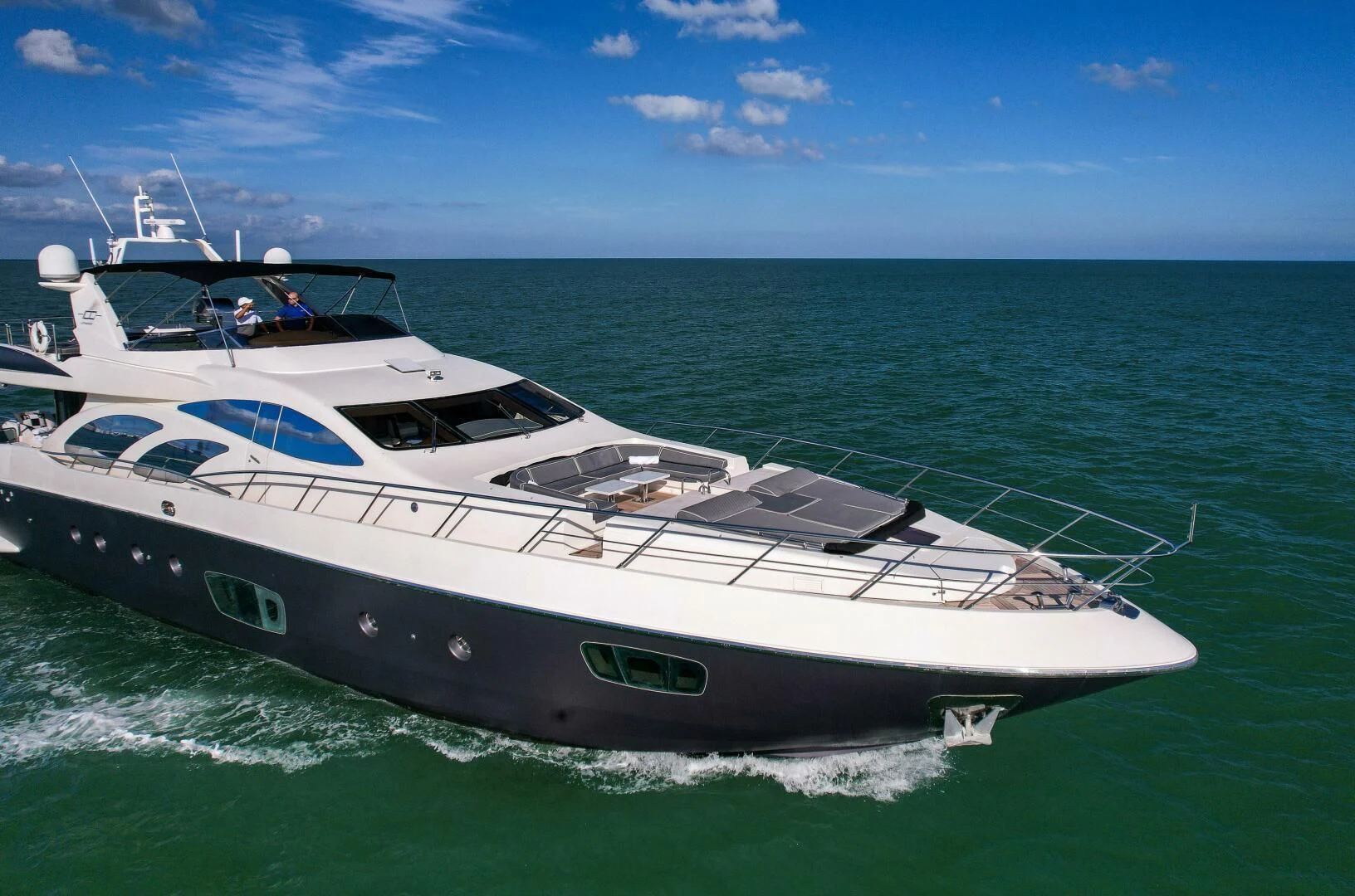 a white yacht on the water aboard INTERVENTION Yacht for Sale