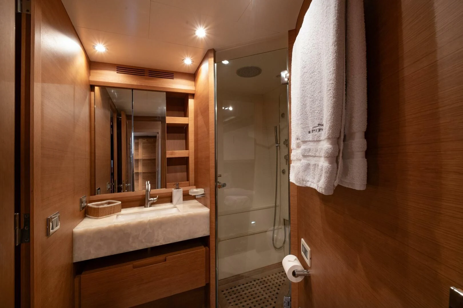 a bathroom with a sink and a mirror aboard INTERVENTION Yacht for Sale