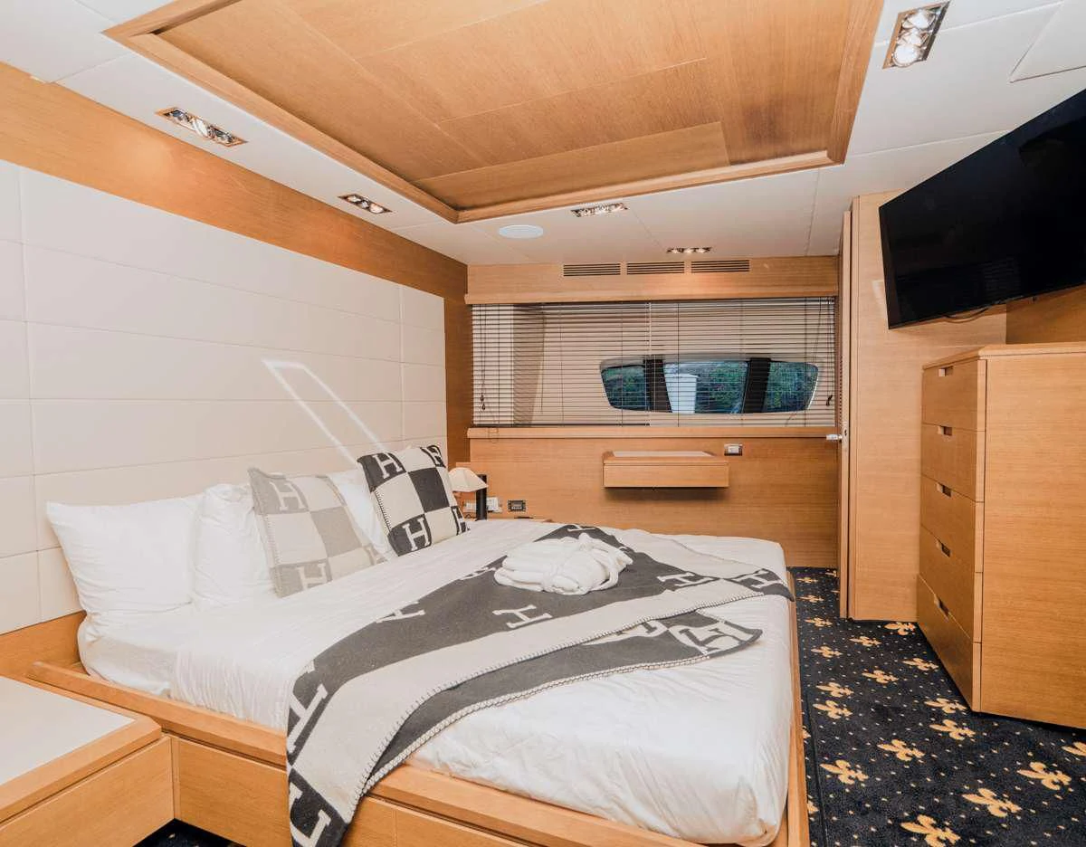 a bed in a room aboard INTERVENTION Yacht for Sale