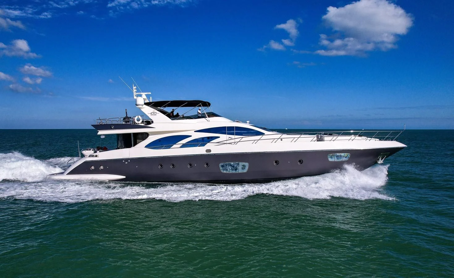 a white yacht on the water aboard INTERVENTION Yacht for Sale