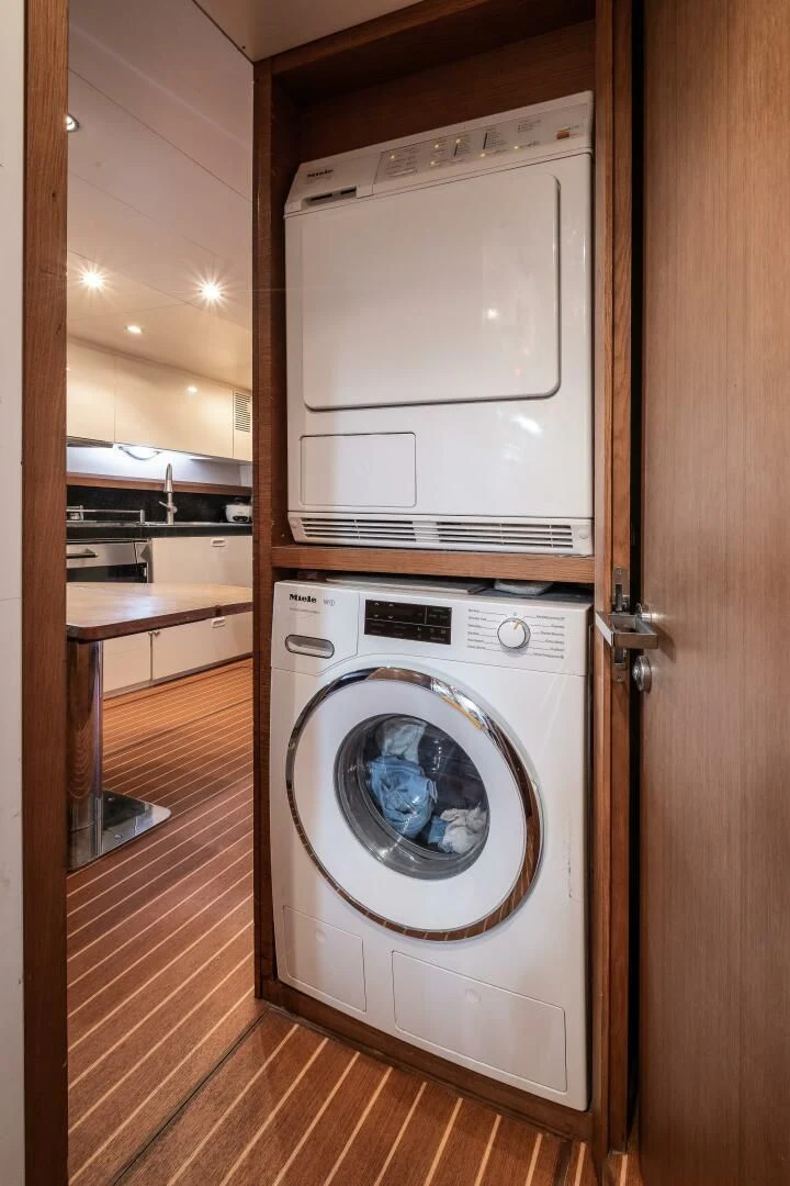 a washing machine in a room aboard INTERVENTION Yacht for Sale