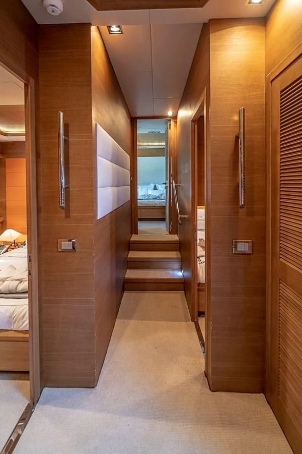 a hallway with a glass door aboard INTERVENTION Yacht for Sale