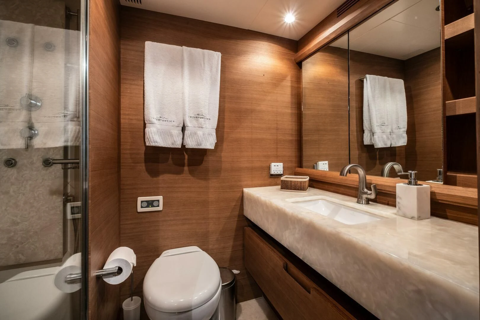 a bathroom with a large mirror aboard INTERVENTION Yacht for Sale