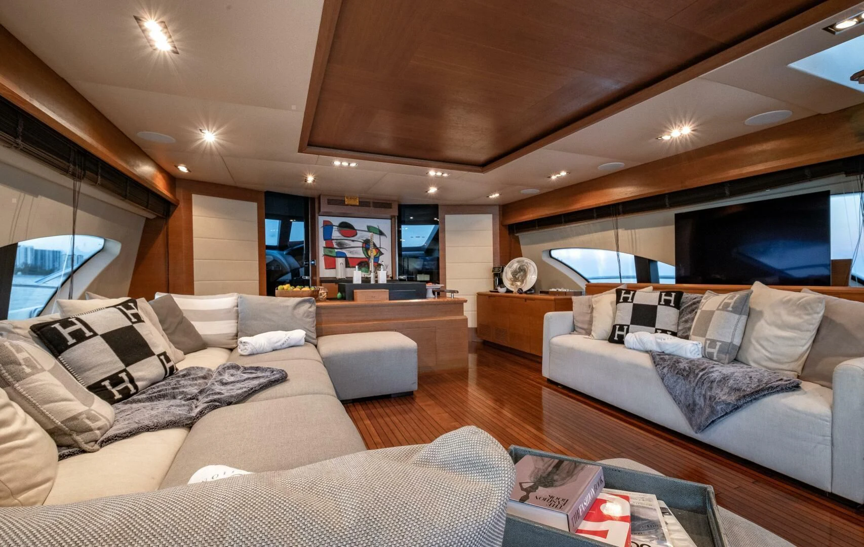 a living room with a large window aboard INTERVENTION Yacht for Sale