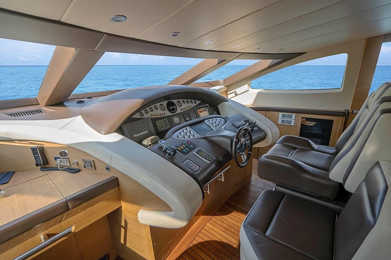 a car seat with a steering wheel aboard INTERVENTION Yacht for Sale