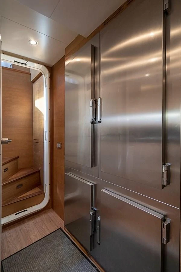 a large stainless steel refrigerator aboard INTERVENTION Yacht for Sale