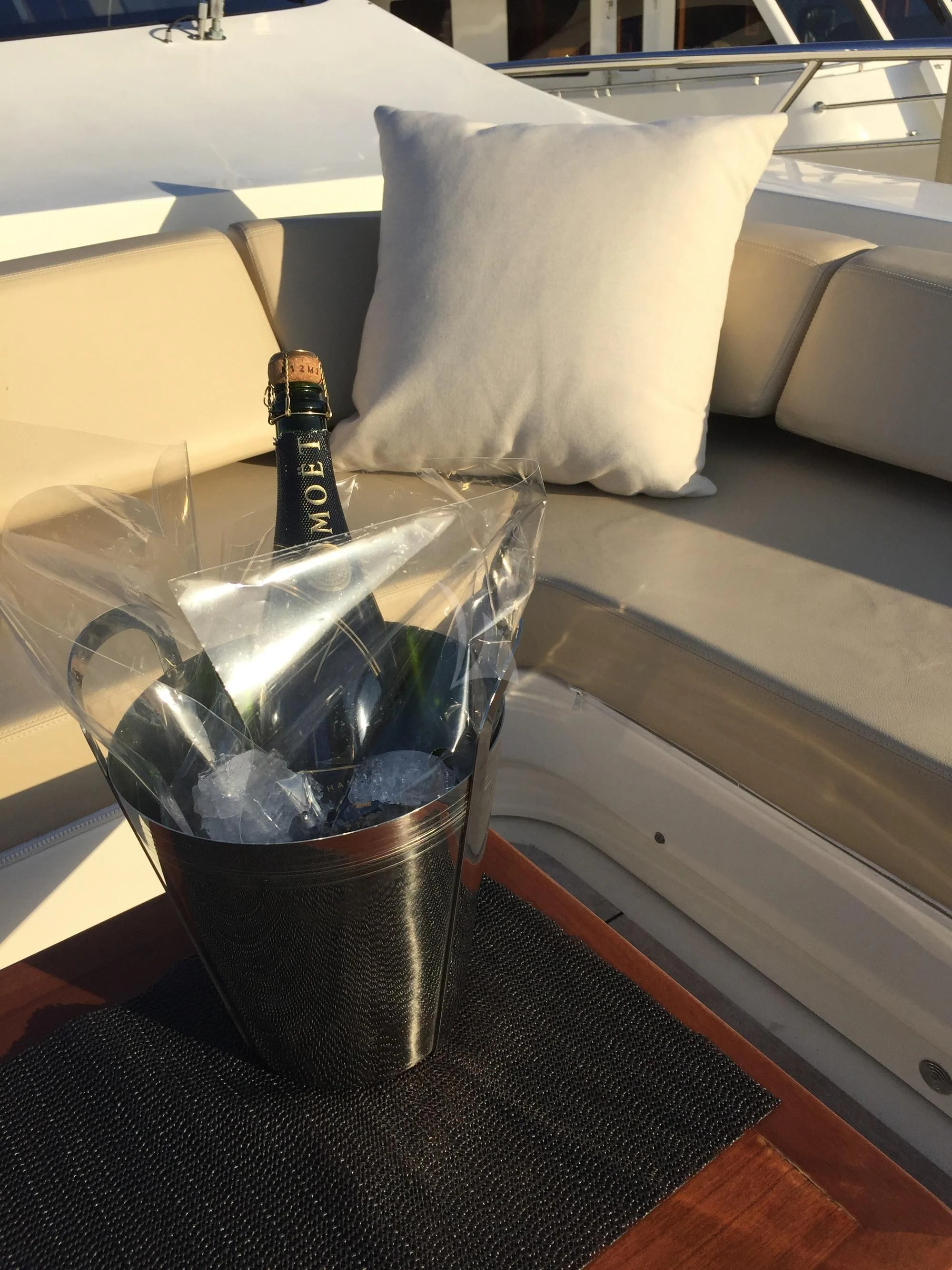 a bottle of alcohol on a table aboard INTERVENTION Yacht for Sale