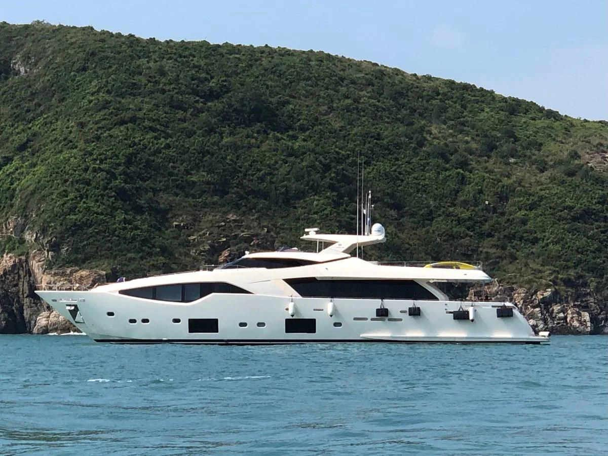 a boat on the water aboard CUSTOM LINE 108 Yacht for Sale