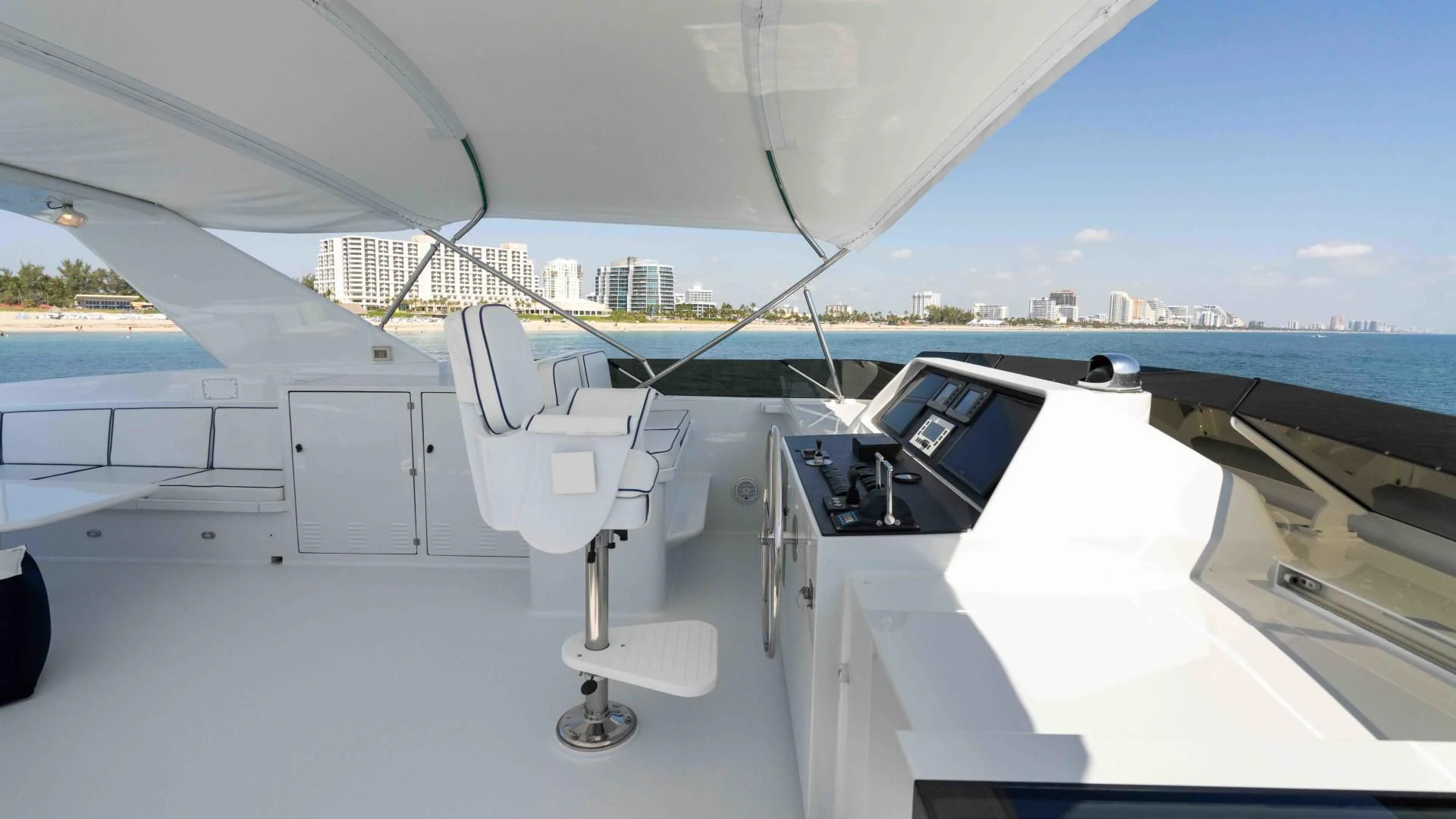 a plane wing and a body of water aboard WELL DONE Yacht for Sale