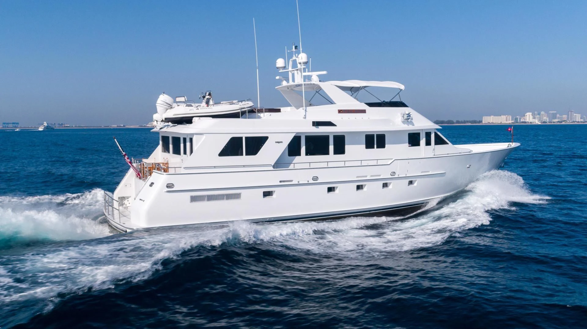 a large white boat aboard WELL DONE Yacht for Sale