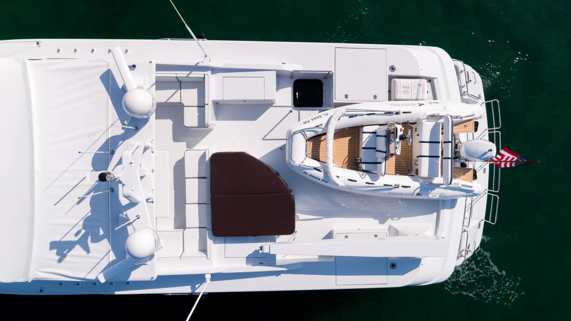 a boat on the water aboard WELL DONE Yacht for Sale