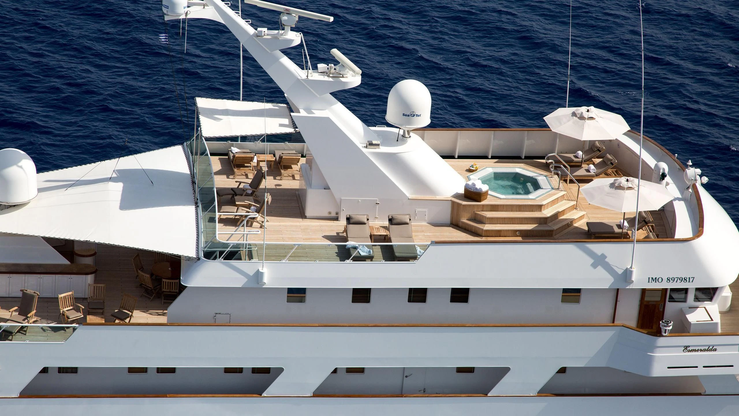 a white yacht on the water aboard ESMERALDA Yacht for Sale