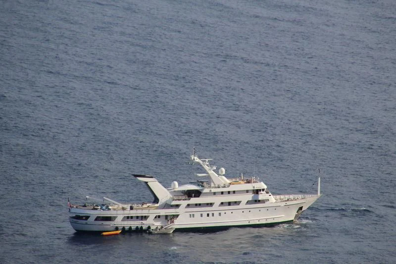 a couple of boats in the water aboard ESMERALDA Yacht for Sale