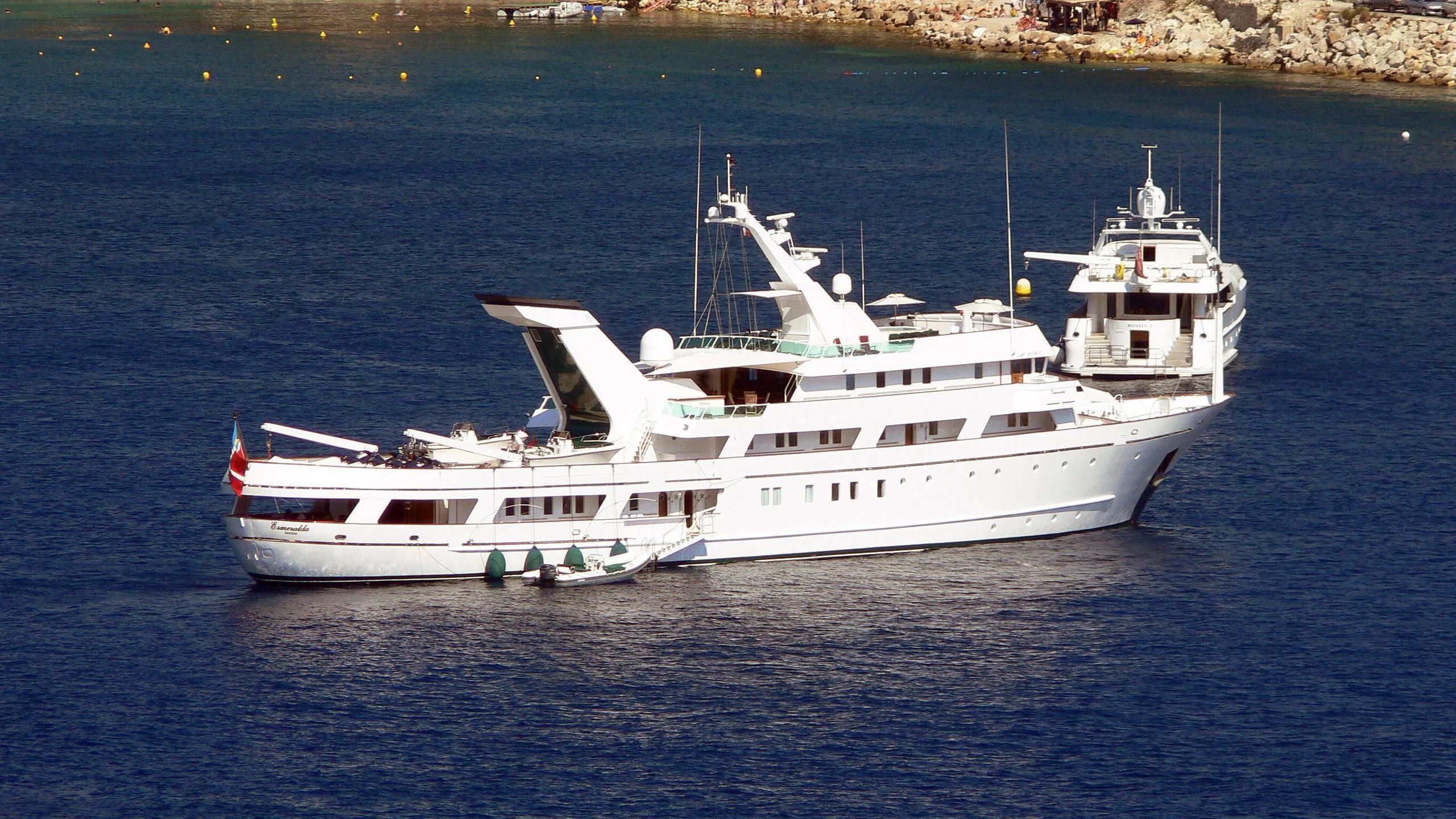 a couple of white boats in the water aboard ESMERALDA Yacht for Sale