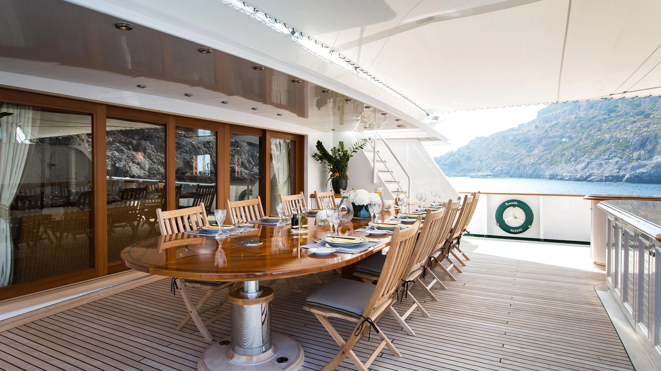a table set for a meal aboard ESMERALDA Yacht for Sale