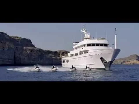 a large white ship in the water aboard ESMERALDA Yacht for Sale