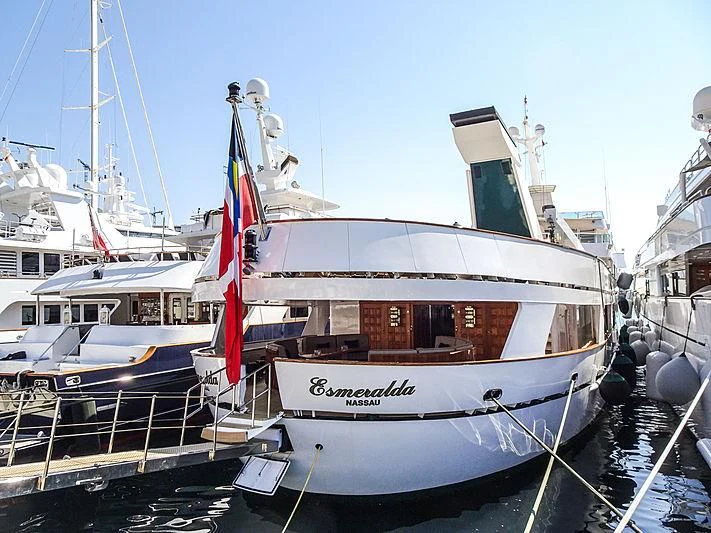 a boat docked at a pier aboard ESMERALDA Yacht for Sale
