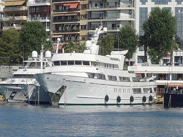 a large white boat sits in the water aboard ESMERALDA Yacht for Sale