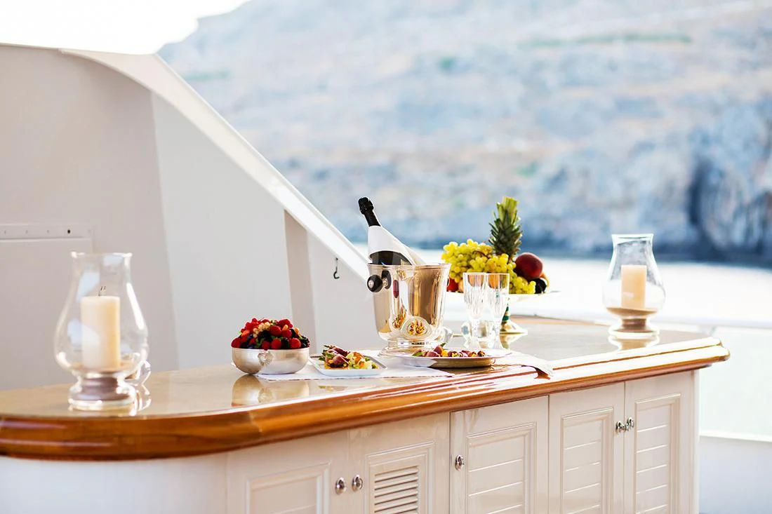 a kitchen with a view of the ocean aboard ESMERALDA Yacht for Sale