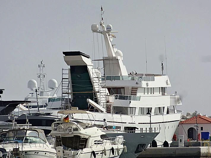 a large white boat with a ladder on top of it aboard ESMERALDA Yacht for Sale