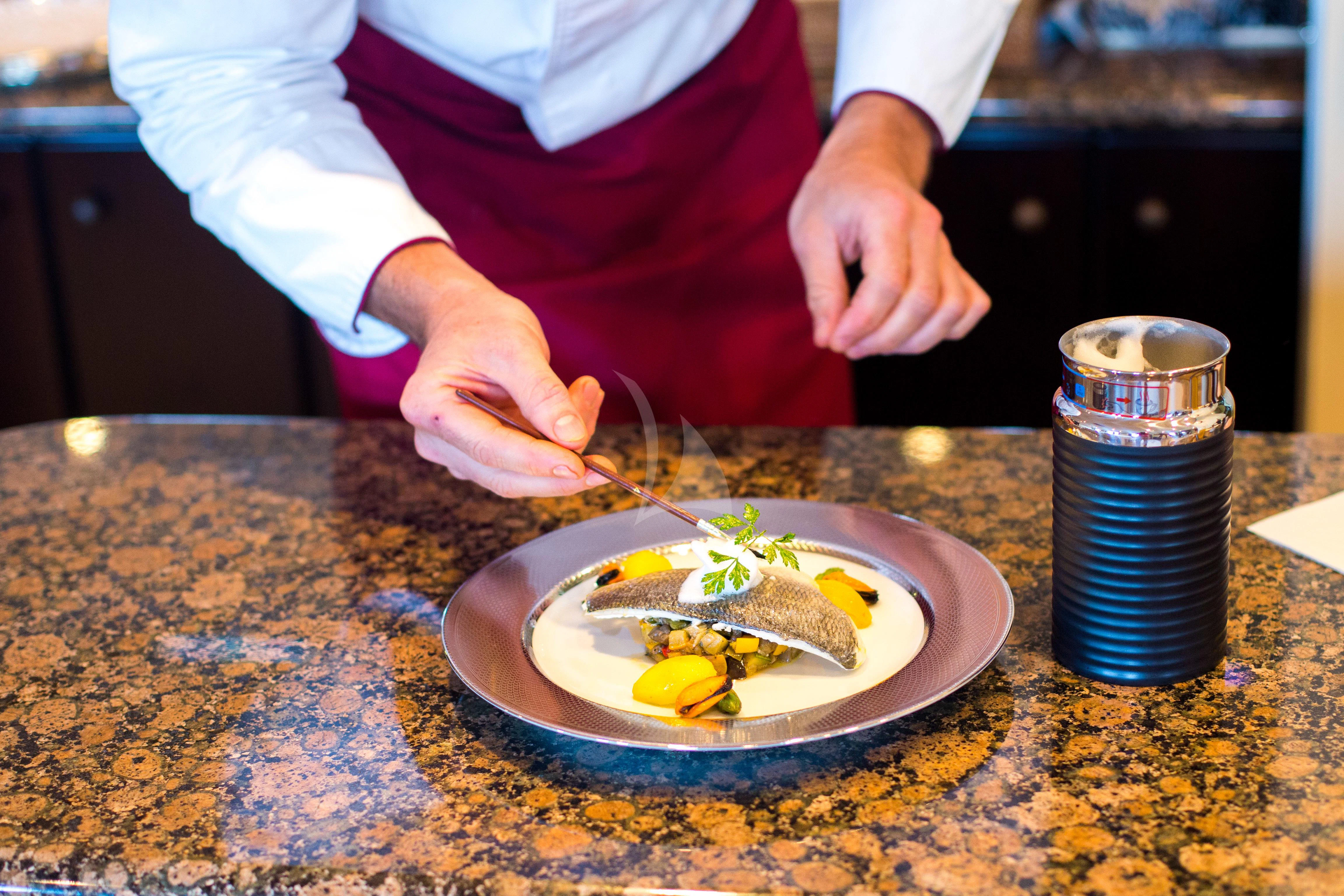 a person eating food aboard ESMERALDA Yacht for Sale