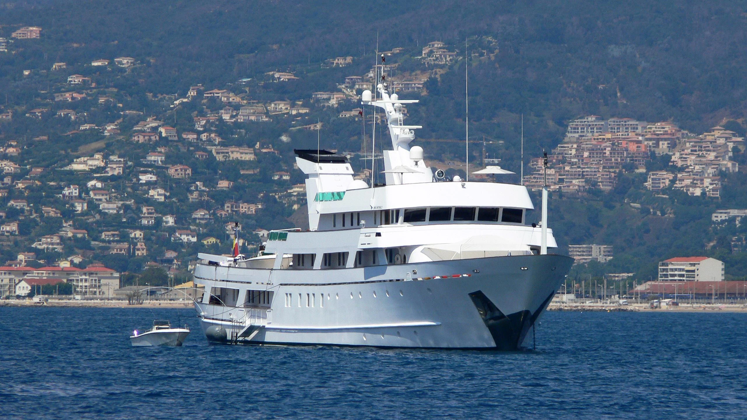 a white boat in the water aboard ESMERALDA Yacht for Sale